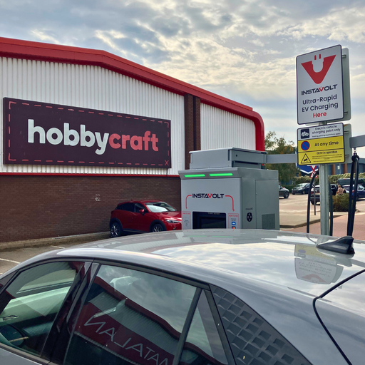 An InstaVolt ultra-rapid EV charging unit is located directly in front of the Hobbycraft store, offering convenient charging for shoppers at Tower Retail Park.