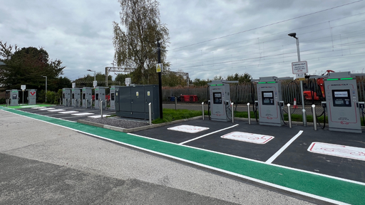 EV charging area with InstaVolt units and clear bay markings in Stafford