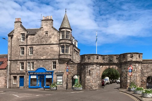Front of Repair St Andrews shop beside West Port