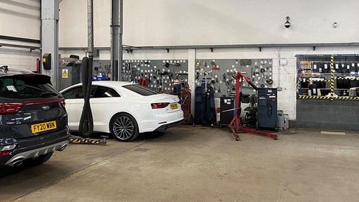 Cars inside the Vauxhall Service Centre Middlesbrough workshop