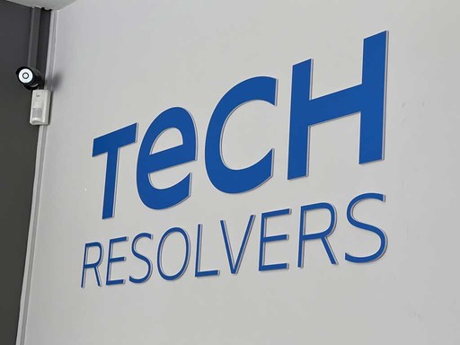 Tech Resolvers phone repair Norwich wall logo.