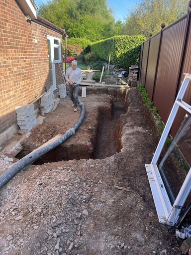 Pouring cement into trenches