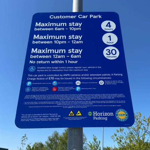 Parking information sign displaying customer car park stay limits at Parc Fforestfach Swansea.