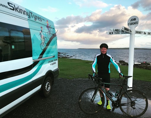 Support van with cyclist in John o'Groats