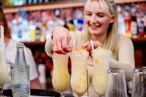 Staff preparing drinks
