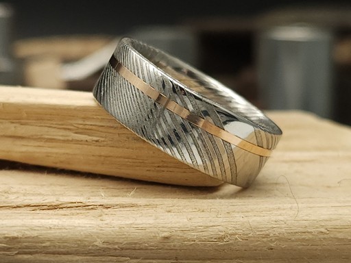 gold inlay in damascus steel ring