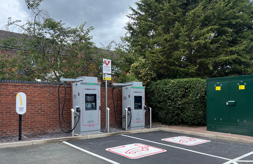 Angled view of the InstaVolt ultra rapid EV charging station at McDonald's, providing a convenient charging stop for EV drivers with nearby food and refreshments.