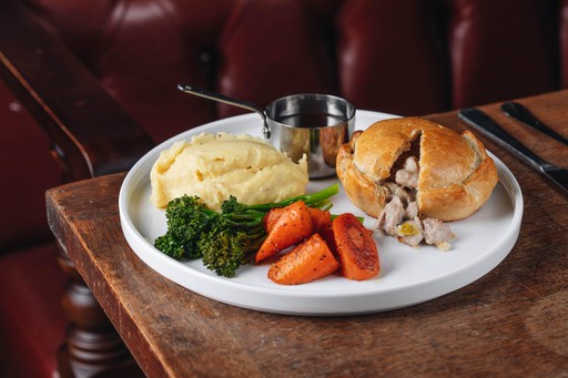 Hand-raised Charter pie, chicken, ham & leek, buttered mash, spring greens