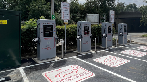 A row of InstaVolt ultra-rapid electric vehicle chargers with clearly marked bays located at Grantham Squash & Fitness Club, just off the A1. Ideal for convenient charging on the go.