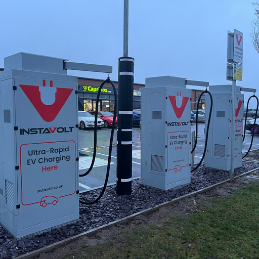 Ultra-rapid InstaVolt charging units located at Co-op Noble Road, Cannock, with nearby retail units including Caprinos Pizza and dedicated EV bays.