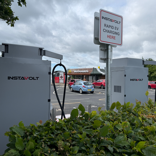 InstaVolt rapid chargers next to McDonald's, offering convenient EV charging while you dine.