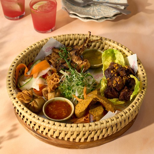 Giggling Squid - Starters Menu. The Bangkok Sharing Platter serving 2 or 3 people. Includes Herby Lamb Cutlets, Golden Money Bags, Jaew Beef Tips, Spicy Thai Herb Sausage.