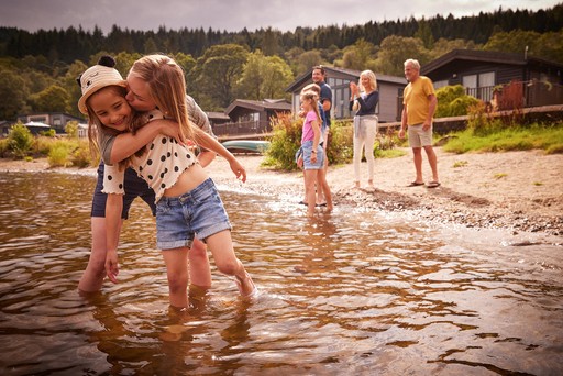 Family having fun on Loch Lomond