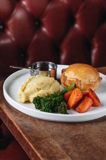 Hand-raised Charter pie, chicken, ham & leek, buttered mash, spring greens