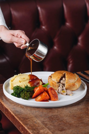 Hand-raised Charter pie, chicken, ham & leek, buttered mash, spring greens