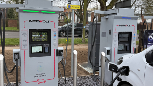 Multiple InstaVolt ultra rapid EV chargers at McDonald’s Norwich with an electric vehicle plugged in and roadside access nearby.