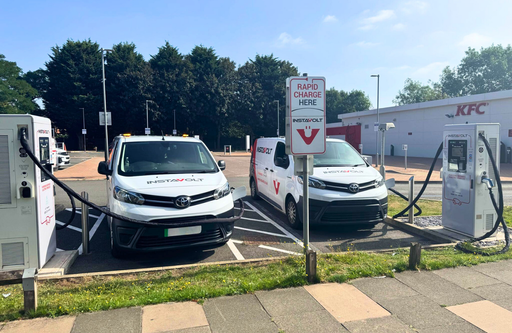 InstaVolt ultra rapid EV charging station outside KFC Sheldon in Birmingham, with clear charger markings and signage, under a cloudy sky.